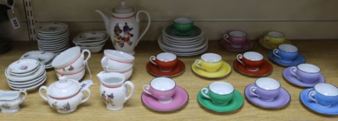 A Haidinger dolls house dinner service, a child's teaset and a harlequin set of coffee cups and