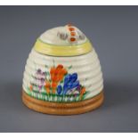 A Clarice Cliff spring crocus honey jar and cover