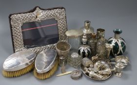 Mixed items including silver photograph frame, pepperettes, spill vases and pair of clothes