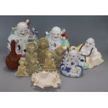 Four Chinese porcelain figures of Budai, seven soapstone carvings and a Japanese bottle vase