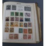 A dark green Triumph Stamp Album - all world used issues, including three pages of late