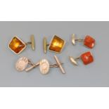 A pair of 14k gold and jasper cufflinks, a pair of 9ct gold and amber cufflinks and one other pair