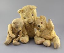 A 1930's Chiltern bear and two others, tallest 19in.