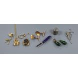 A pair of 9ct gold cufflinks, a 9ct padlock clasp with charms, and other items including articulated