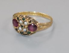 A late Victorian 15ct gold and gem set dress ring, in the "suffragette" colours, size S.