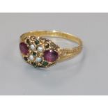 A late Victorian 15ct gold and gem set dress ring, in the "suffragette" colours, size S.