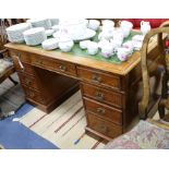 A Maple & Co walnut pedestal desk W.137cm