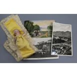 A White Five Pounds note and three £1 notes, collection of postcards and a French bisque miniature