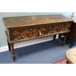 A 17th century style oak dresser base, W.153cm