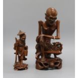 Two Chinese wooden figural carvings tallest 28cm