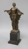 An Art Deco style bronze figure of a lady wearing a robe, on marble base, signed D.H. Chiparus