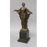 An Art Deco style bronze figure of a lady wearing a robe, on marble base, signed D.H. Chiparus