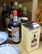 Nine assorted bottles of spirits including seven rums, Blue label Smirnoff and vintage port