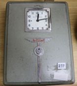 A Smiths clocking in clock width 27cm