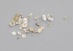 A small quantity of loose cut unmounted stones including diamond.