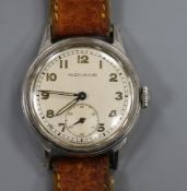 A gentleman's 1940's stainless steel Movado mid size manual wind wrist watch.