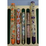 Three ornate fountain pens, cased and two giant ornate fountain pens, 6.75in.