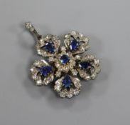 A Victorian yellow and white metal, sapphire and diamond set flower head pendant, with diamond set