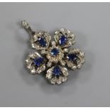 A Victorian yellow and white metal, sapphire and diamond set flower head pendant, with diamond set