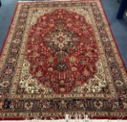 A Tabriz carpet 300 x 199cm