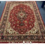 A Tabriz carpet 300 x 199cm