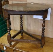 A small oak cricket table W.67cm