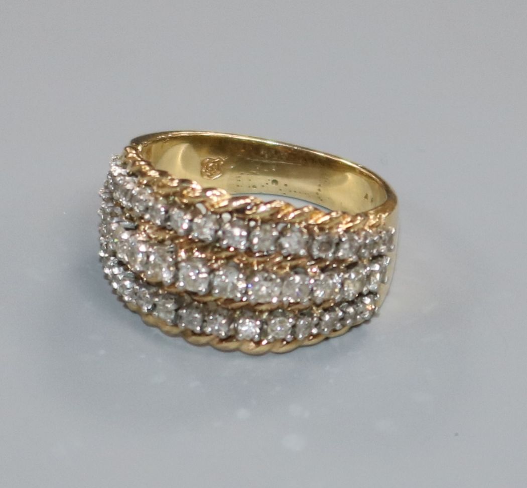 A yellow metal and three row diamond dress ring, size L. - Image 2 of 2