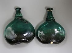 Two 17th century green glass bottles