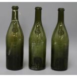 Three 19th/20th century sealed wine bottles, embossed seal 'F M' 30cm high