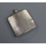 A George VI engine turned silver hip flask, A. Wilcox, Birmingham, 1939, 11cm.