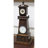A late Victorian carved oak "Lighthouse " clock barometer by Frank Flower of St James