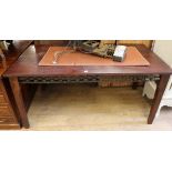 A Spanish style hardwood dining table with decorative wrought iron frieze W.166cm