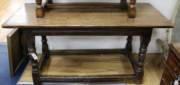 A 17th century style small oak refectory table W.152cm