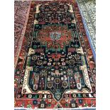 A Hamadan rug 276 x 133cm