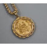 A George V 1925 gold full sovereign in 9ct gold pendant mount, on a yellow metal chain.