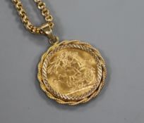 A George V 1925 gold full sovereign in 9ct gold pendant mount, on a yellow metal chain.