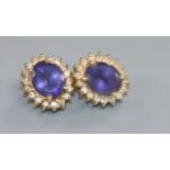A pair of 14ct gold, amethyst and diamond oval cluster ear studs.