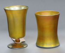 Two Tiffany favrille iridescent glass cups, engraved mark 'L C Tiffany favrille' Tallest 12cm