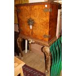 A walnut and gilt cocktail cabinet on stand W.100cm