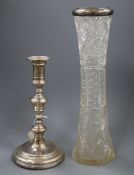 A 1920's silver candlestick and a late Victorian silver mounted tall glass vase.