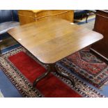 A Regency oak tripod table W.87cm