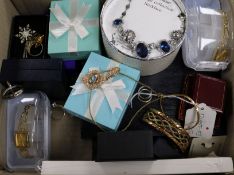 A small quantity of assorted costume jewellery, including a pair of 9ct white gold hoop earrings.