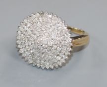 A modern 9ct gold and pave set diamond dress ring, (one stone missing), size V.