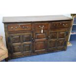 A George III oak dresser W.156cm