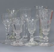 Seven wine glasses, various, including two 18th century examples with faceted stems and another with