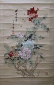 A Chinese scroll painting of flowers