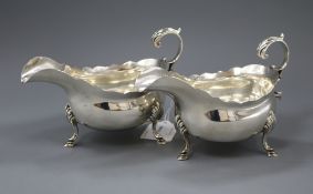 A pair of Georgian style silver sauce boats, Elkington & Co, Sheffield 1911, height 12.2cm, 17.5