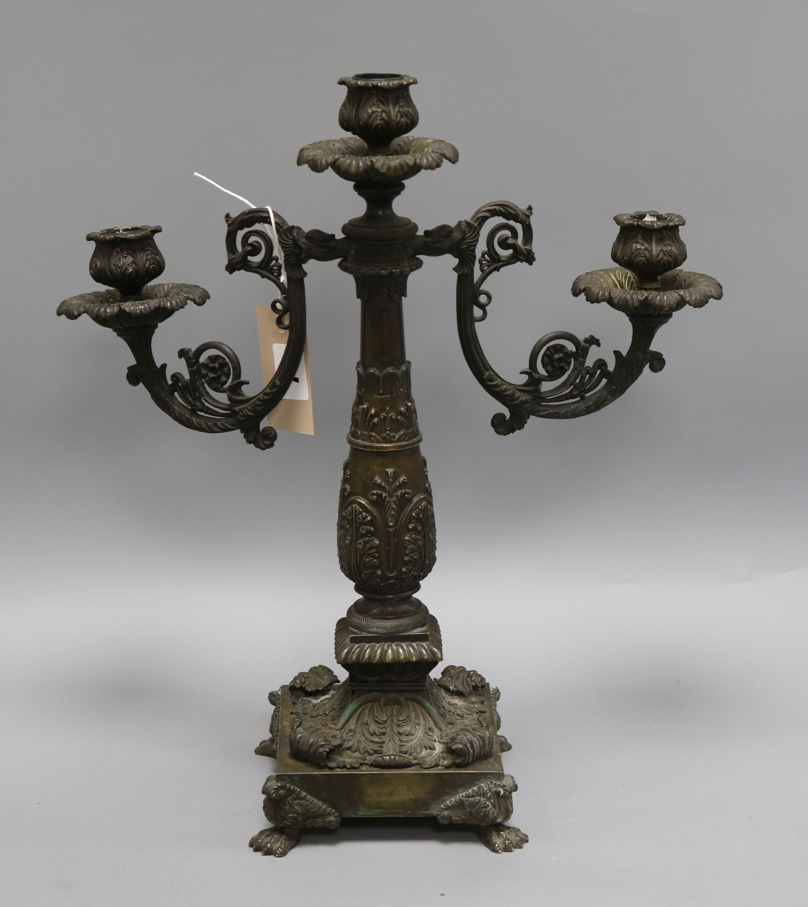 A 19th century neo-classical bronze candelabra height 42cm