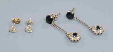 Two pairs of 9ct gold and gem set ear studs including diamond set.