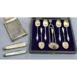 A silver mounted desk clip, two mother of pearl fruit knives including Victorian, a cased set of